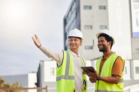 Tablet, teamwork or architecture with an engineer man and designer planning on a Stock Photos