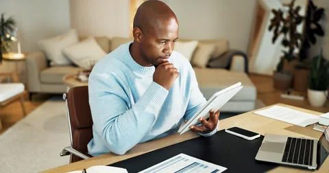 Tablet, thinking and black man in home for finance review, budget planning .. Stock Photos