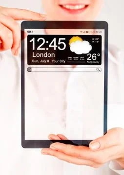 Tablet with transparent screen in human hands. Illustrazione stock