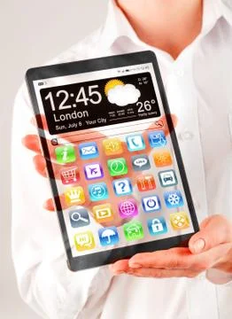 Tablet with transparent screen in human hands. Foto stock