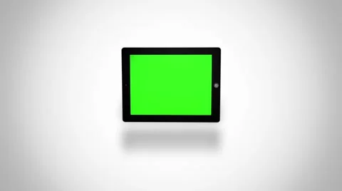 Tablet turns on on white background Stock Footage 47925403