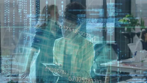 Tablet user reviewing data and initiating code swirl around coworkers for Stock Footage 328015977
