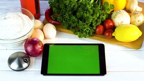 Tablet on vegetable background 4K Stock-Footage 85176470
