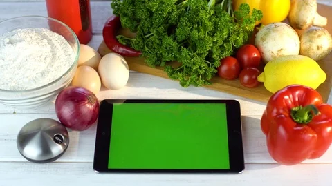 Tablet on vegetable background Video stock 85176453