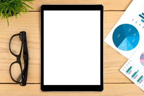 Tablet white screen on business table Stock Photos
