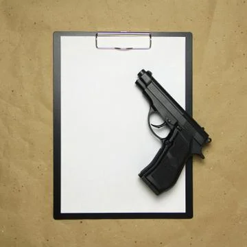 A tablet with a white sheet of A4 format on a beige craft paper. Stock Photos