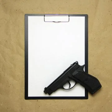 A tablet with a white sheet of A4 format on a beige craft paper. Stock Photos