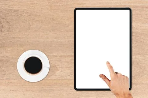 The tablet is on the wood table Stock Photos