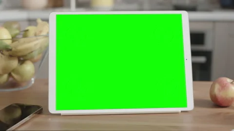 Tablet on Wooden Table in Kitchen Interior Stock Footage 151006329