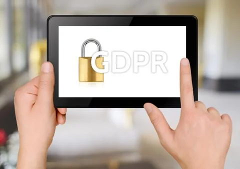 Tablet with word GDPR on the screen Stock Photos