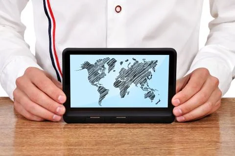 Tablet with world map Stock Photos