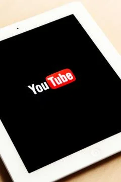Tablet with YouTube logo Stock Photos