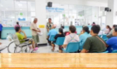 Tabletop with blurred people Stock Photos