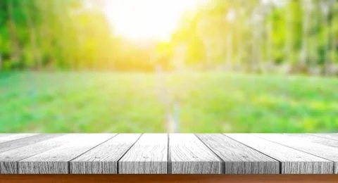 Tabletop with burred nature background Stock Photos