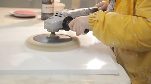 Tabletop on kitchen - worker finishing countertop from artificial Stock Footage 108761194