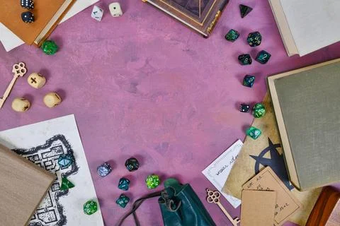 Tabletop role playing flat lay background with colorful RPG dices rule books 스톡 사진