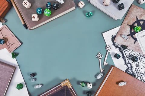 Tabletop role playing flat lay background with colorful RPG dices rule books Stock Photos