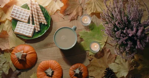 Tabletop video of decorated autumn composition in warm atmosphere with waffles Stock Footage 165827548