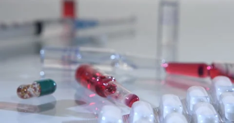 Tablets Ampoules Syringes on table Stock Footage 55909605