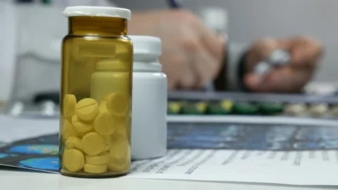 Tablets and doctor in the background Video stock 89401997