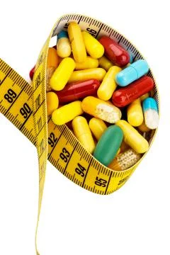 Tablets and measuring tape Stock Photos