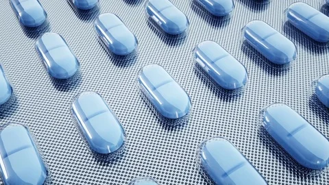 Tablets and pills packed. Mooving camera. Medical concept Видео 73885375