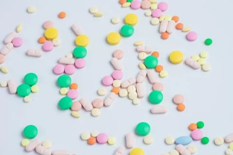 Tablets and pills on a white background Stock Photos