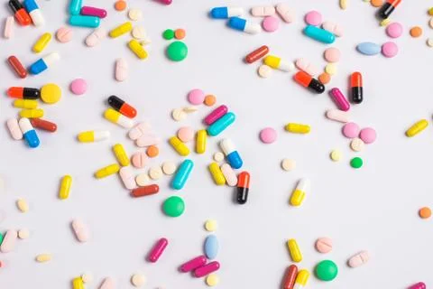 Tablets and pills on a white background Stock Photos