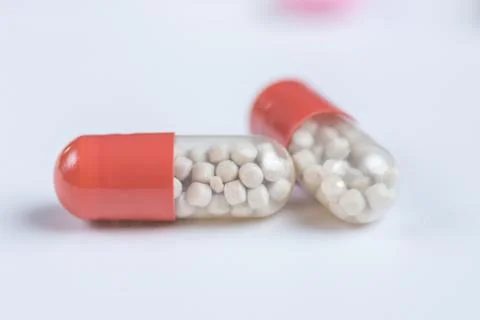 Tablets and pills on a white background Stock Photos