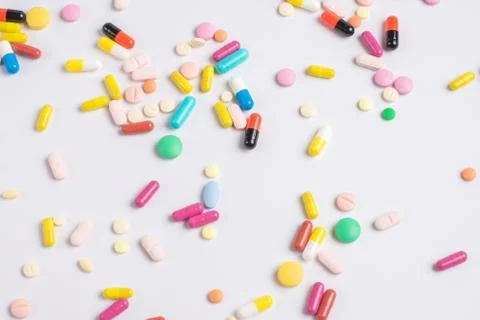 Tablets and pills on a white background Stock Photos