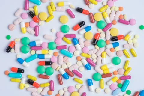 Tablets and pills on a white background Stock Photos