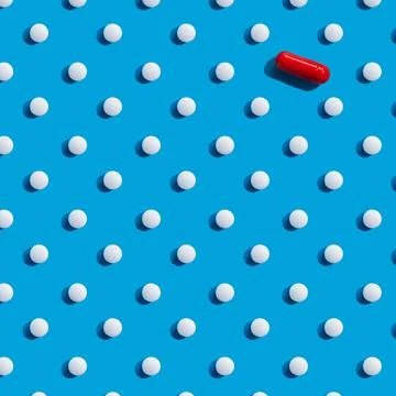 Tablets and red pill. pattern medicine, cardiology Stock Photos