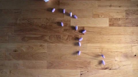 Tablets are poured on the table. Top view Stock Footage 228954780