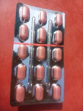 Tablets are solid, oral dosage forms of medication. Stock Photos