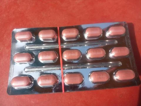 Tablets are solid, oral dosage forms of medication. Stock Photos