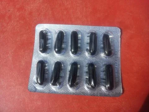 Tablets are solid, oral dosage forms of medication. Stock Photos