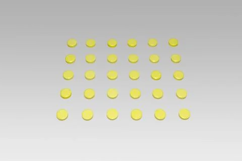 Tablets, arranged in neat shape square matrix. yellow colored Stock Photos