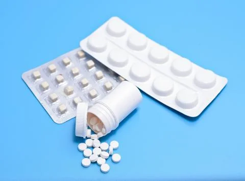 Tablets on a blue background Stock Photos