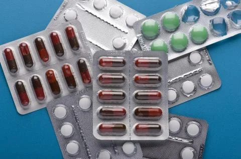 Tablets on blue close up Stock Photos