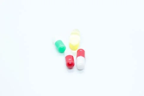 Tablets, capsules, vitamins, located on a white background Stock Photos