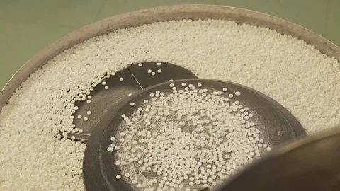 Tablets on the conveyor,drug manufacturing Stock Footage 72650103