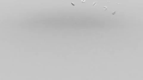 Tablets fall to the floor.Process of production of pills, tablets. Industrial Stock Footage 100185801