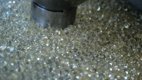 Tablets in a gelatinous shell close-up. Production of medicinal products Stock Footage 171935757