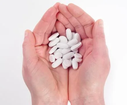 Tablets in hand Stock Photos