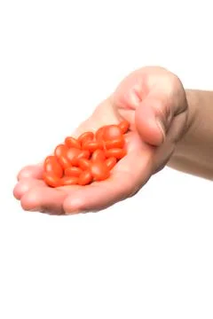 Tablets in hand on white Stock Photos