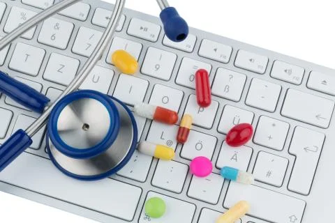 Tablets on keyboard Stock Photos