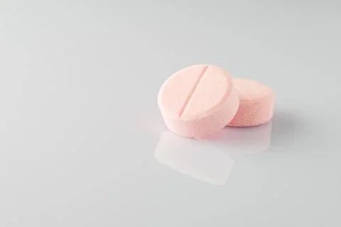 Tablets on a light surface 스톡 사진