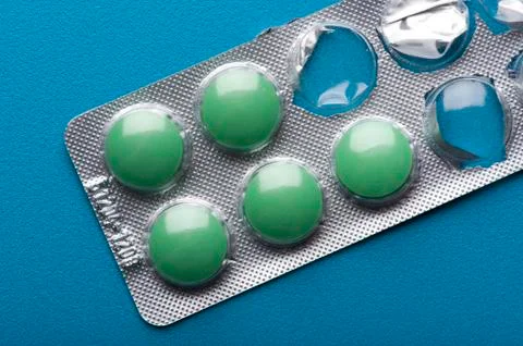 Tablets macro on blue background Foto stock