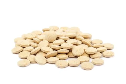Tablets nutritional supplements vitamins on white background. Stockfoto's