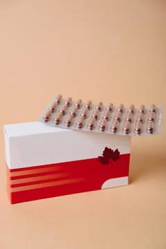 Tablets with packaging close-up on a colored background 스톡 사진